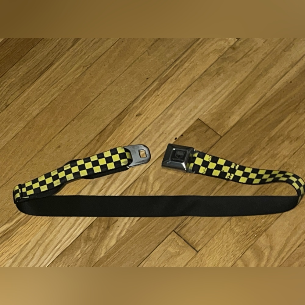 Click it or ticket! Seatbelt designed fashion belt.
